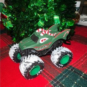 Festive Green Monster Truck Toy with Candy Cane Accents